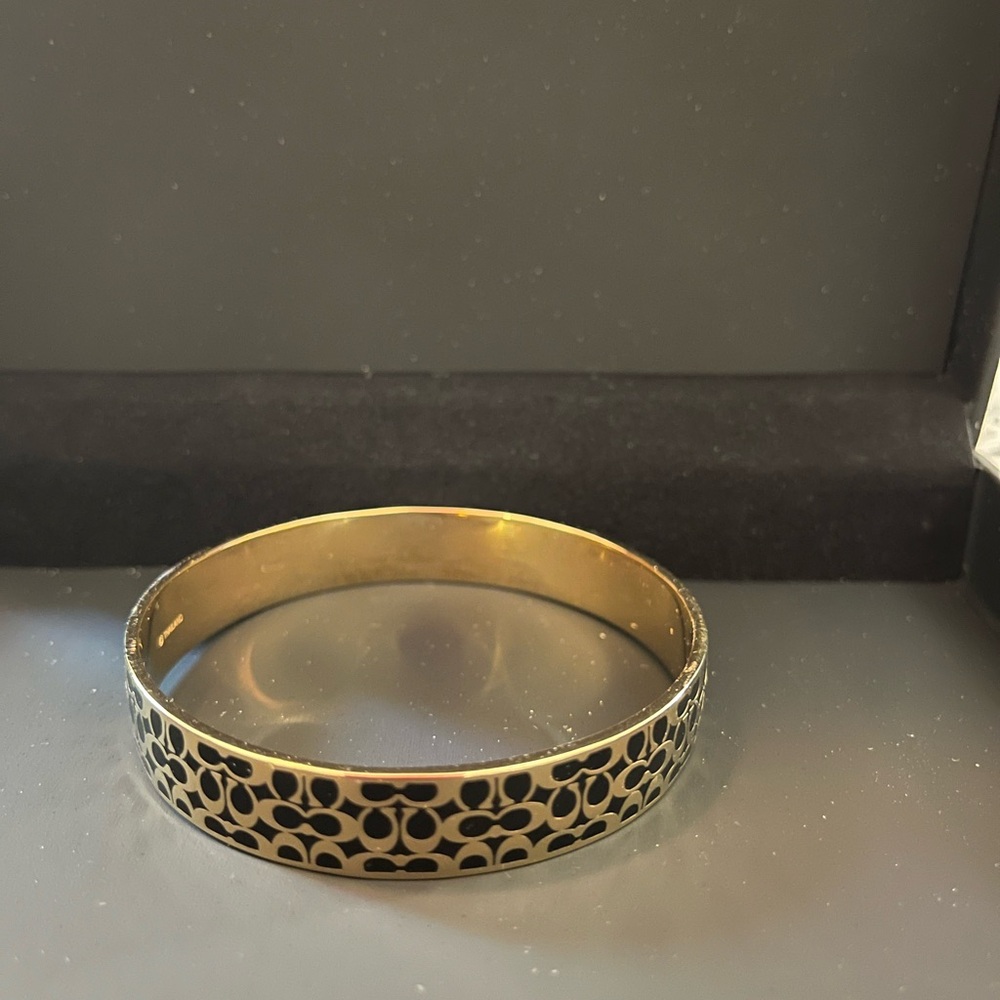 Elegant Coach Gold metal and Black Bangle Bracelet